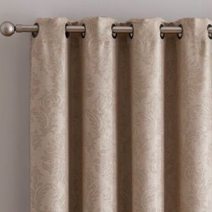 Embossed weave blackout thermal grommet curtain